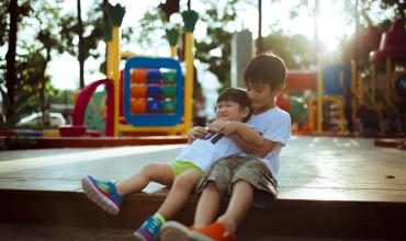 two kids on a playground