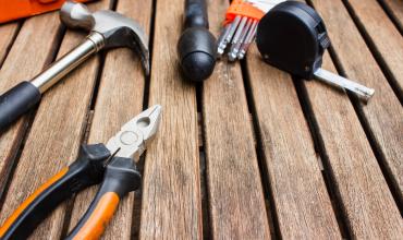 Tools laying on a wooden deck