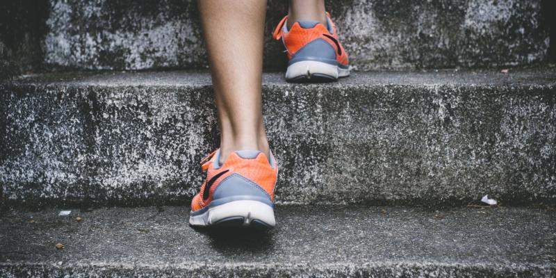 feet running up a flight of stairs